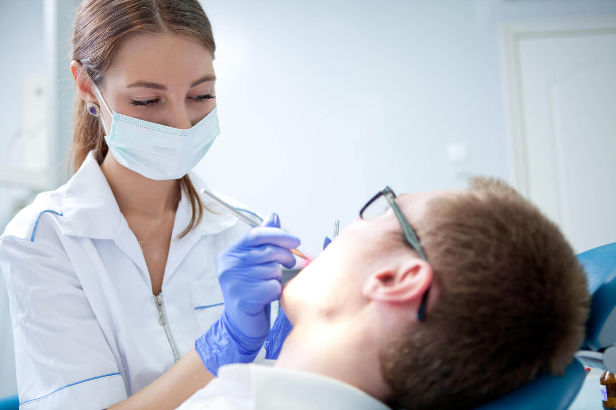 A patient being treated with emergency dental care in Marco Island