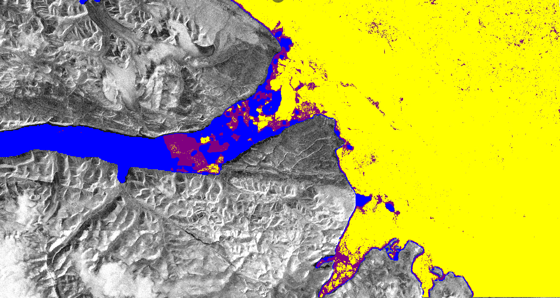 This image shows sea ice characterisation overlaying the composite sentinel-1 imagery. The yellow shows smooth first year ice, the blue is open water, and the purple is young ice.