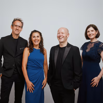 A group of people standing next to each other.