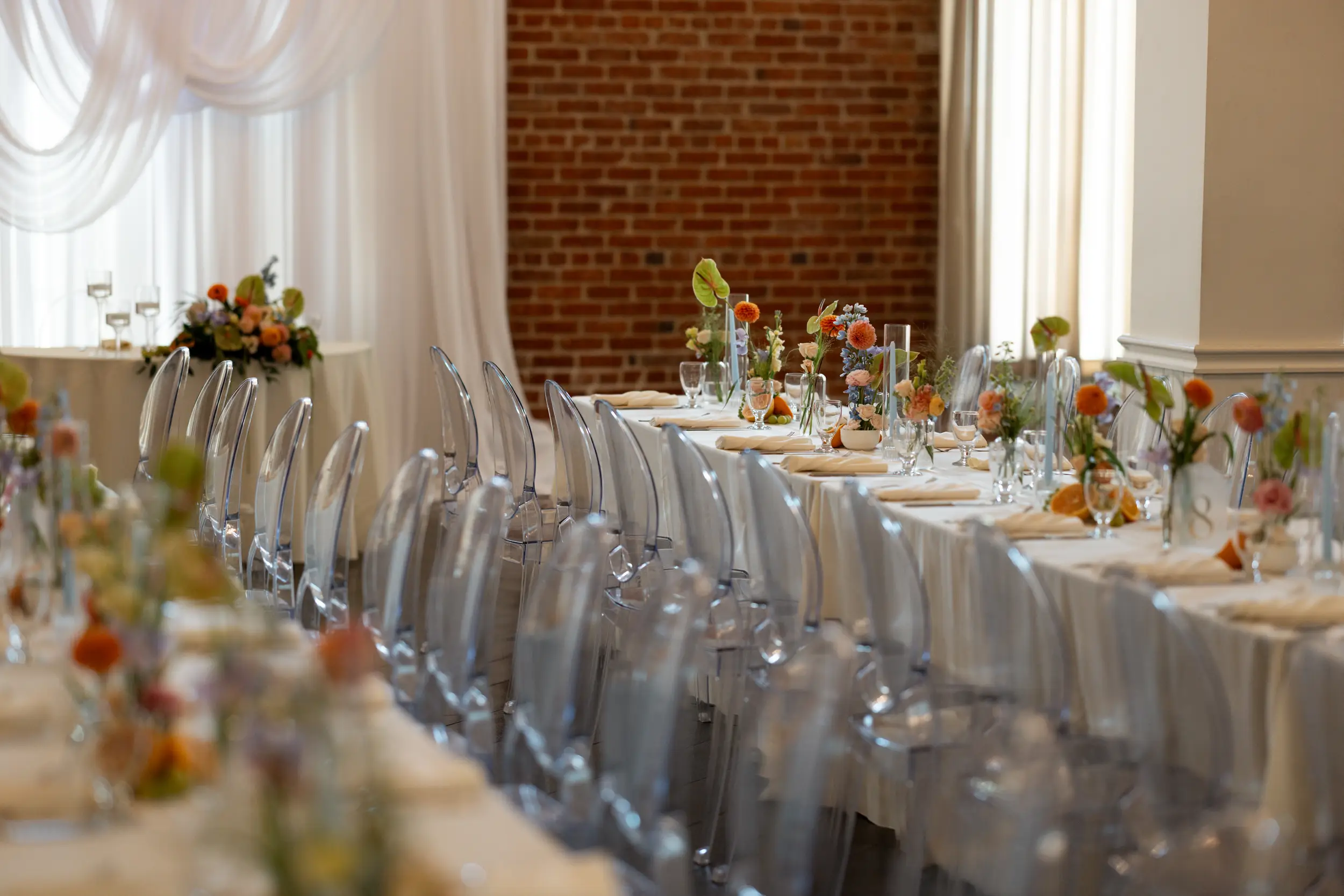 Vibrant floral reception table decor.
