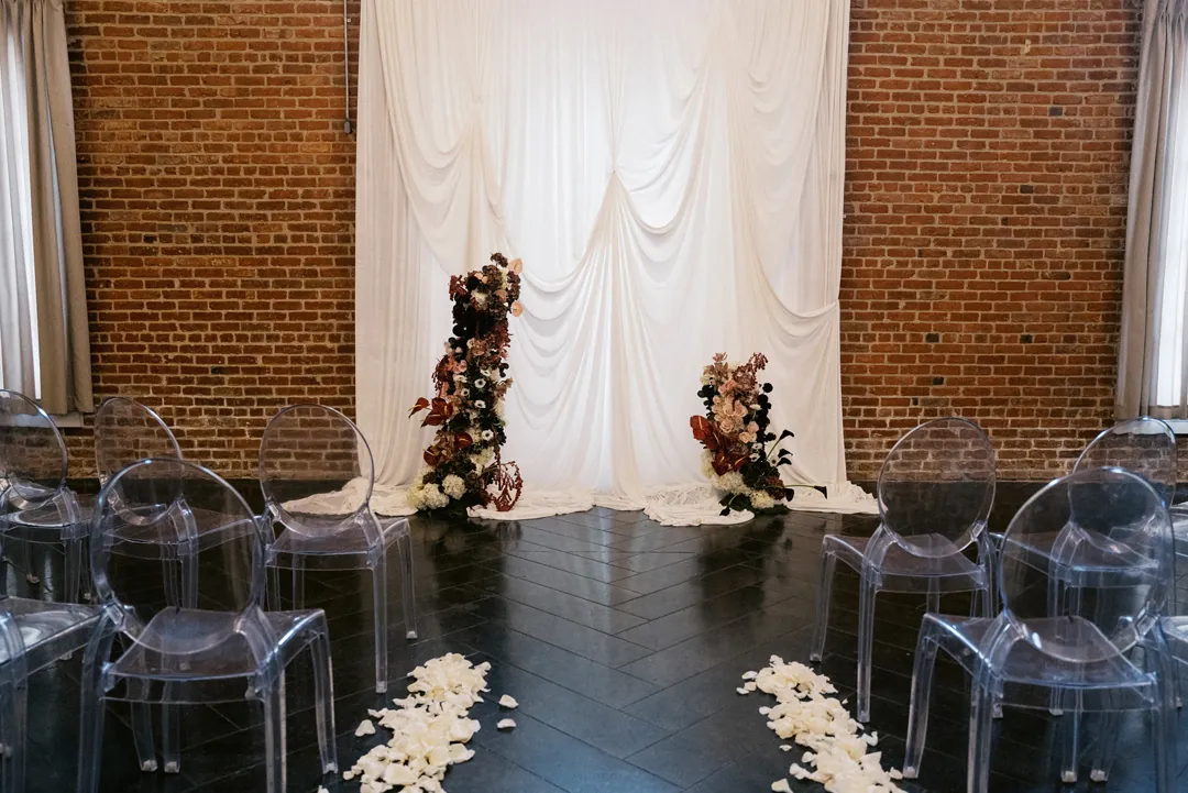Ceremony aisle lined with white petals