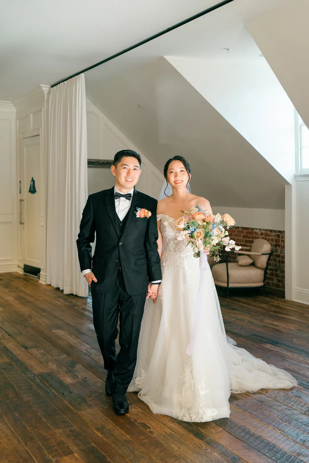 Couple walking together through a loft