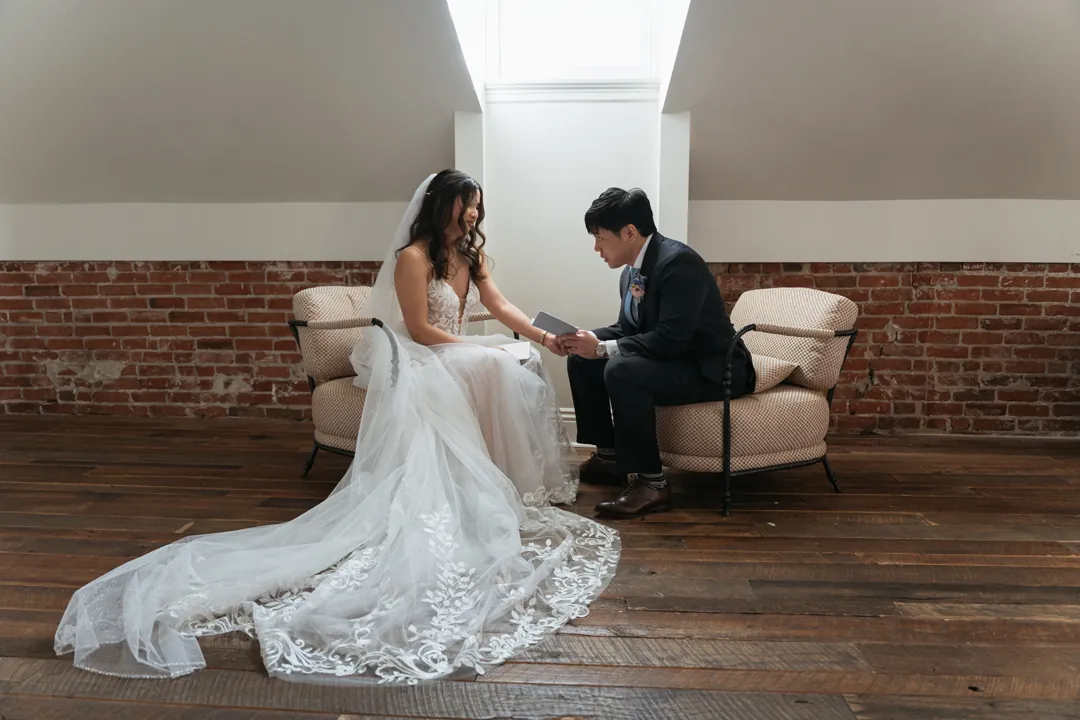 Couple seated together in a loft