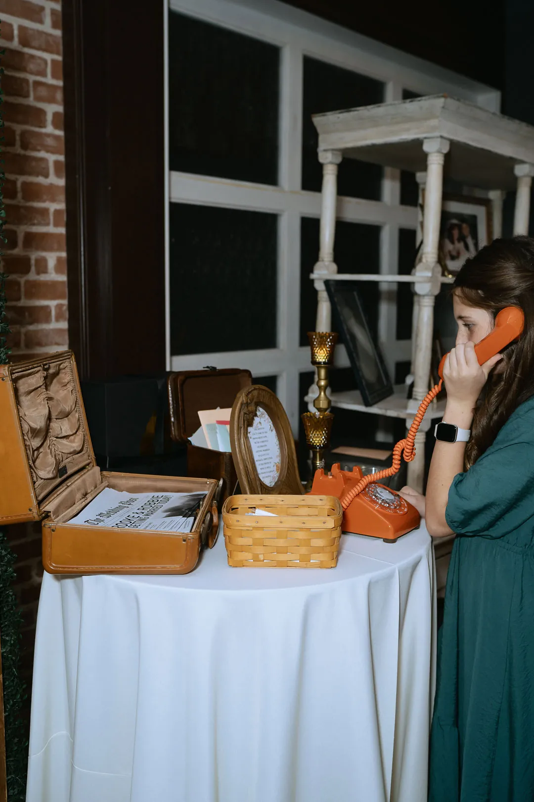 Guests selecting items from a wedding favor table