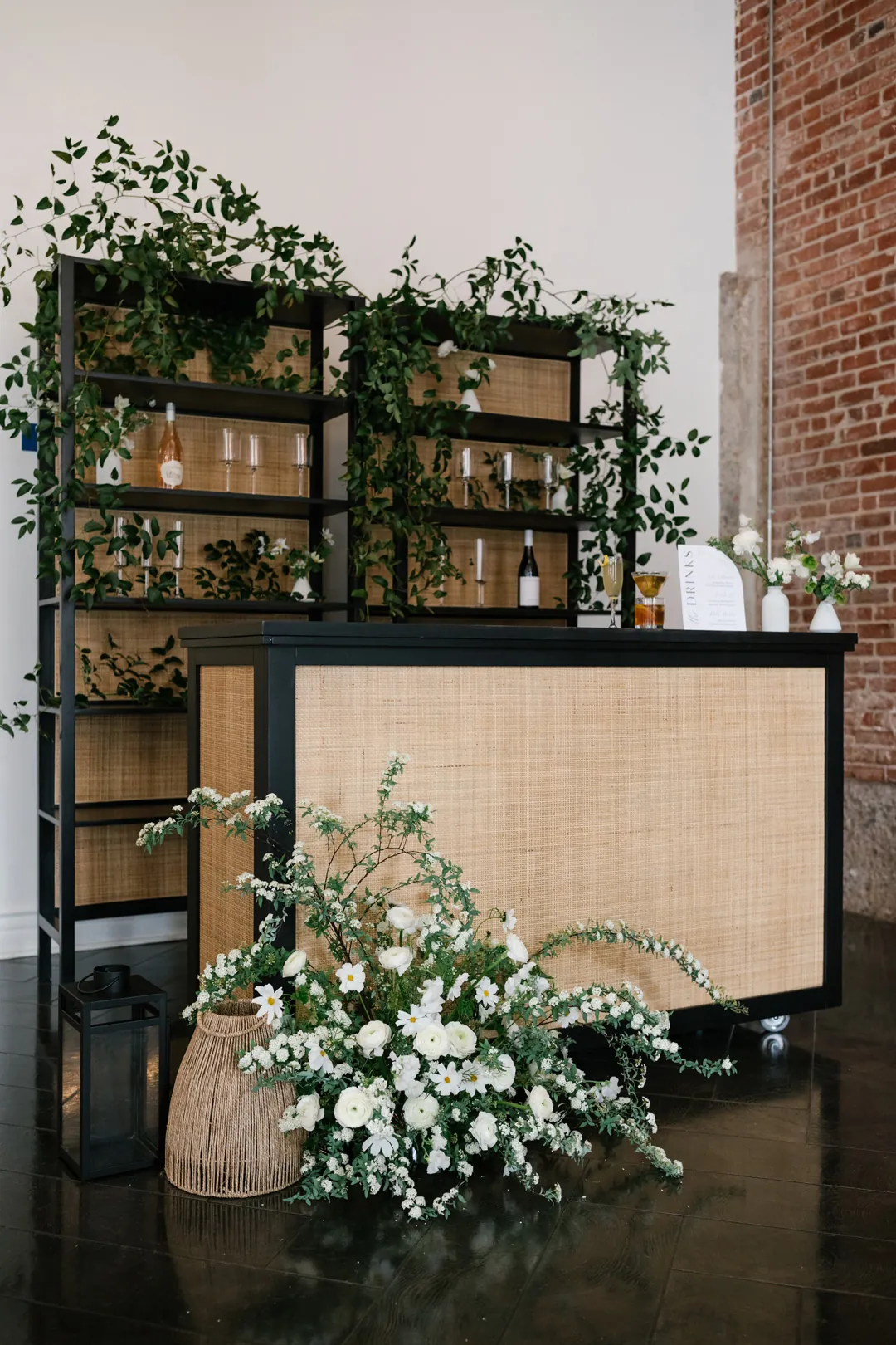 Bar counter with green floral decorations