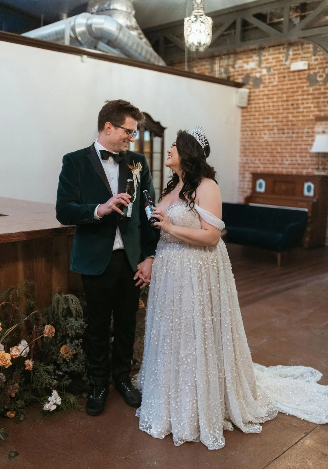 Groom playing saxophone beside the bride