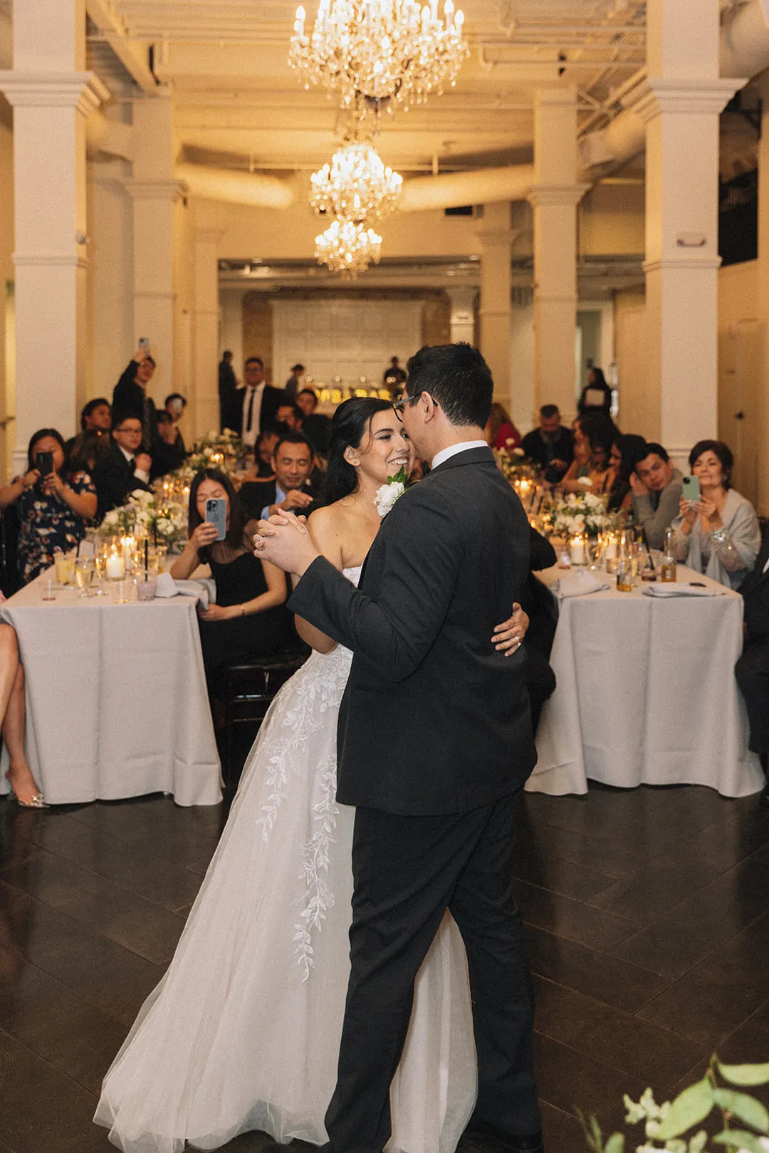 Bride and groom dancing in the ballroom