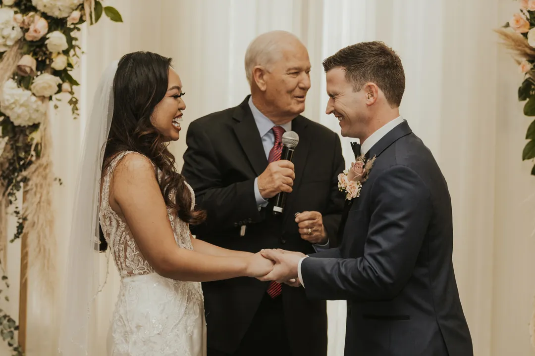Officiant speaks to the couple during their ceremony.