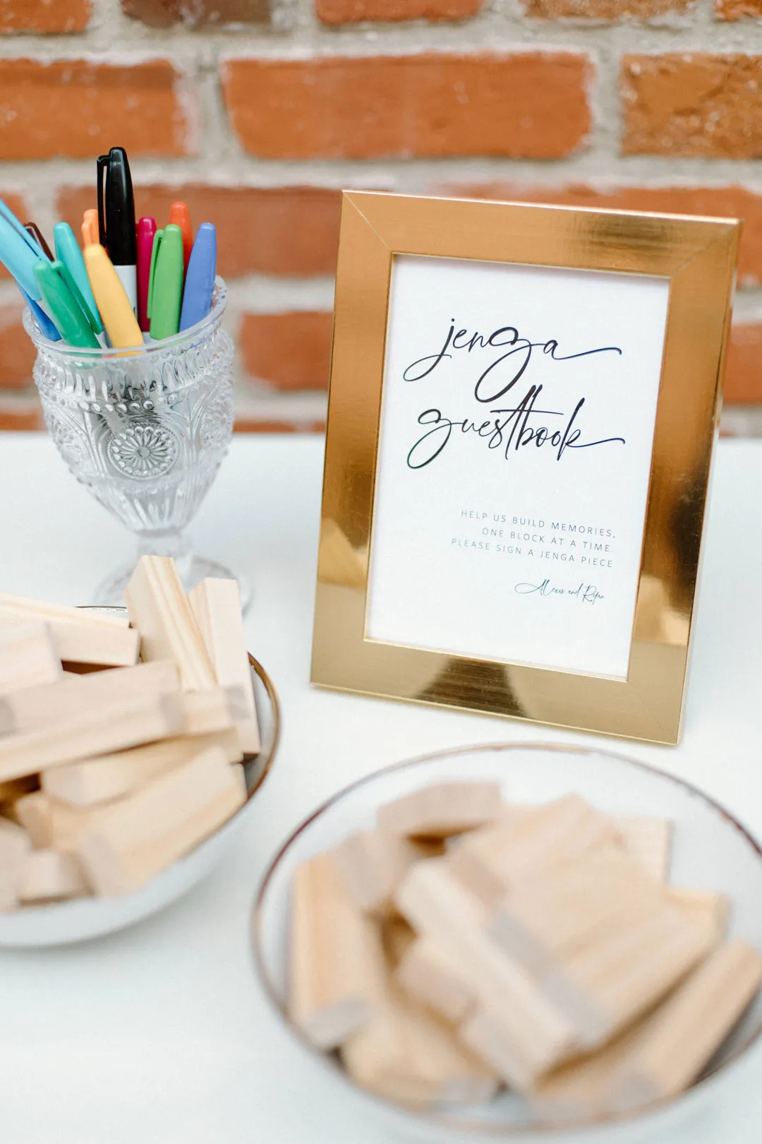 Guest book display with pens and small wooden blocks