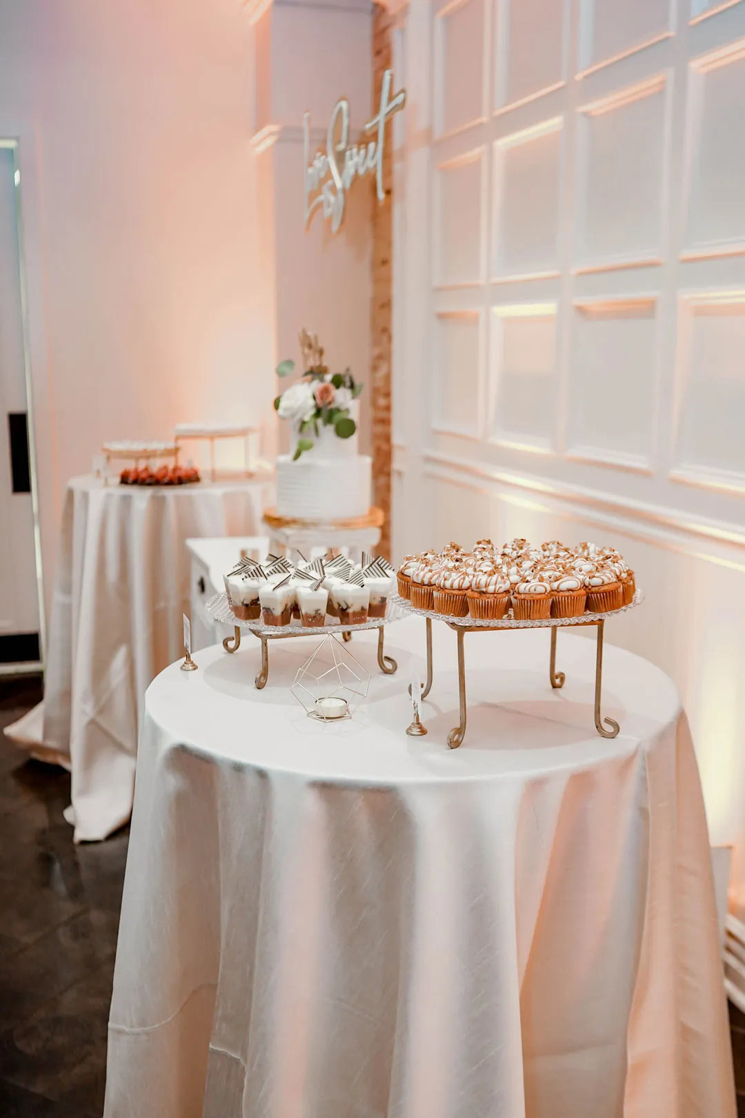 Desserts arranged on a round display table