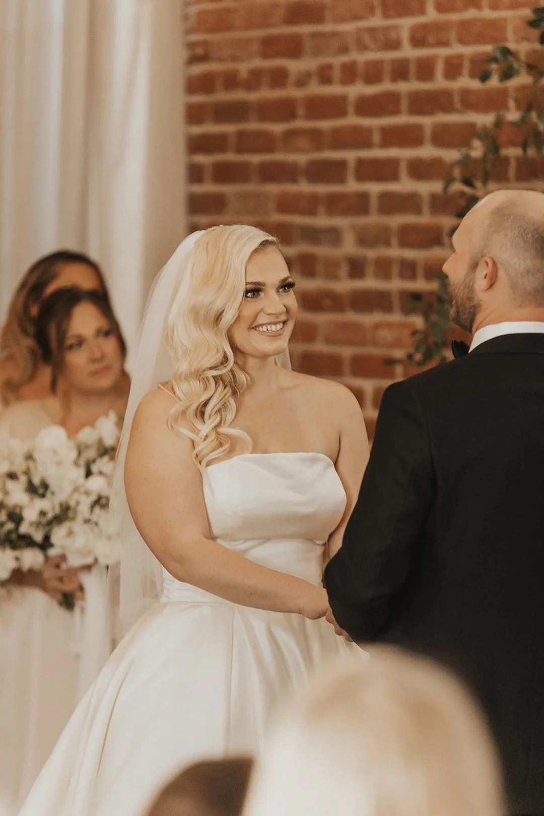 Couple exchanging vows during their wedding ceremony
