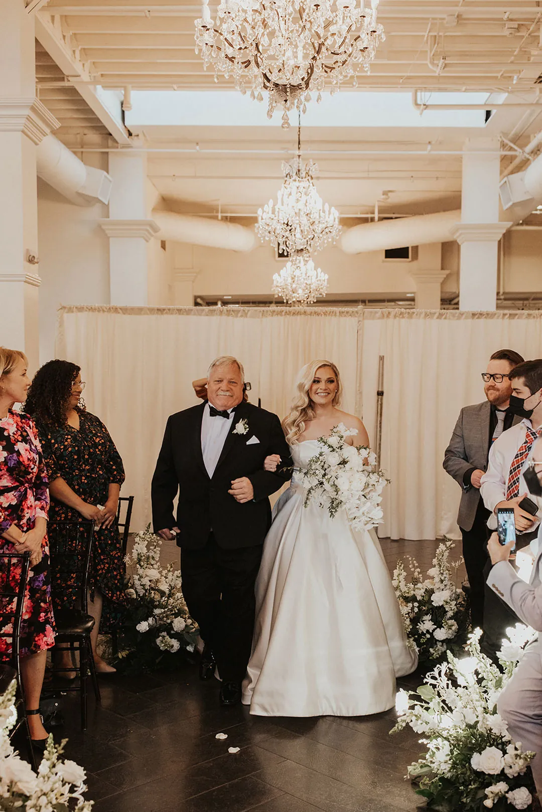Bride entering the ceremony with an escort