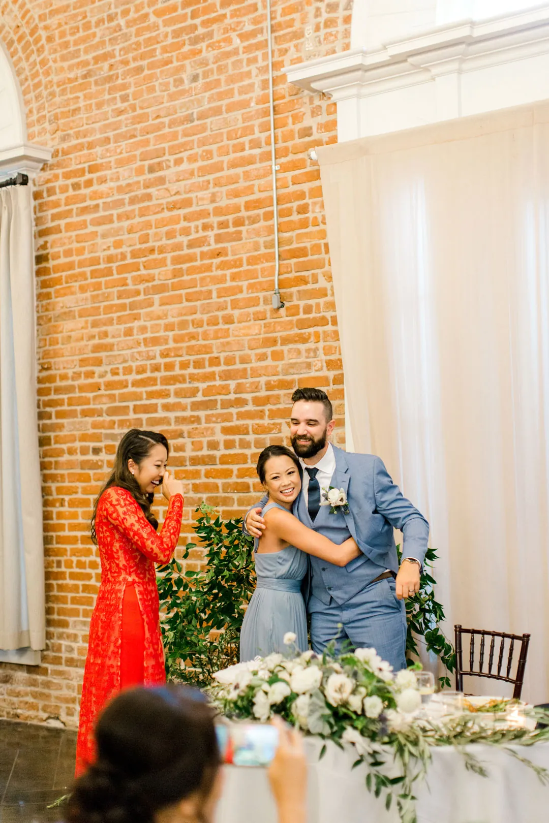 Couple listening to a guest giving a speech