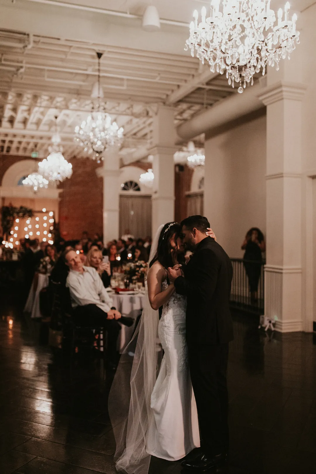 Bride and groom dancing in the ballroom