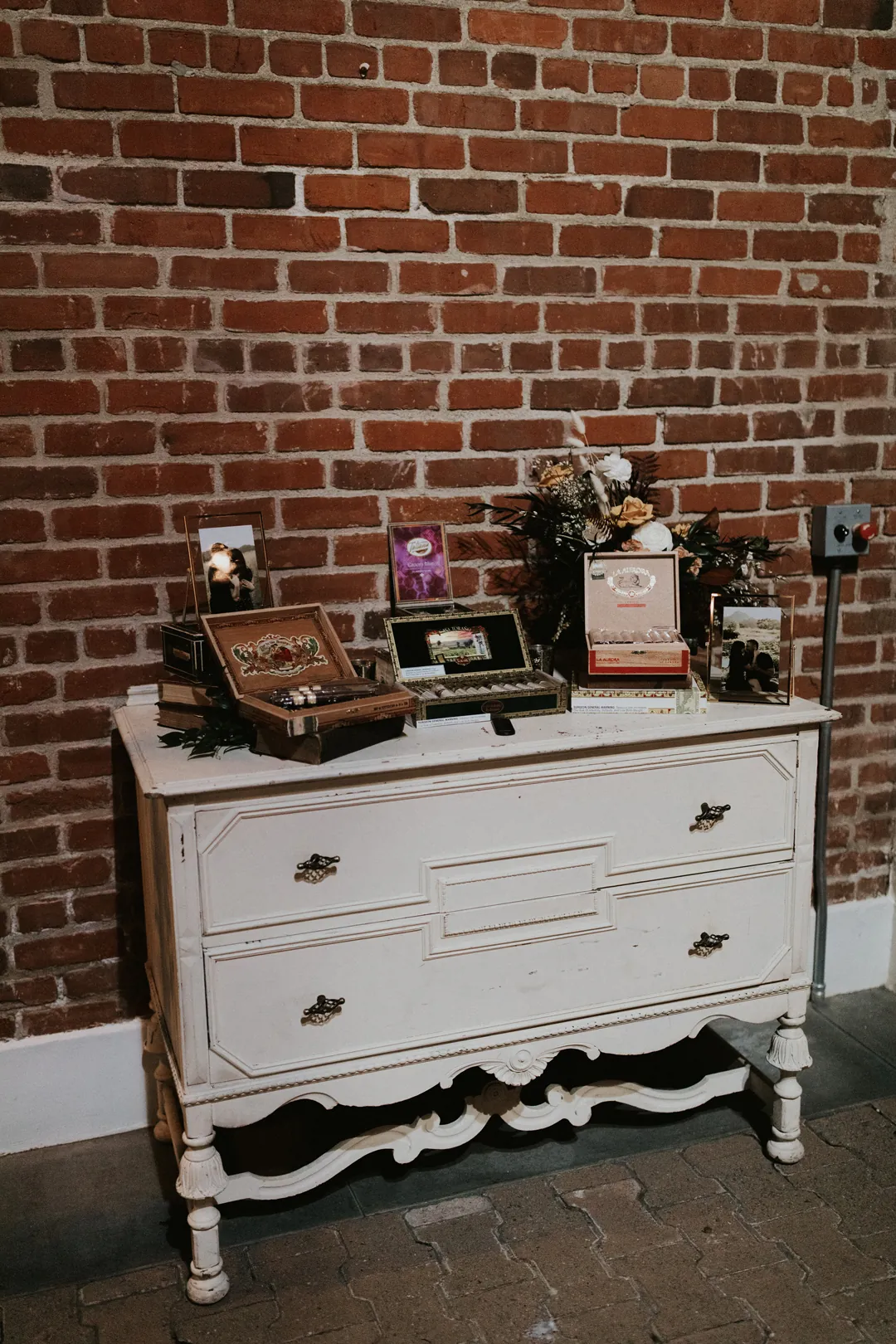 Drinks and glassware on a white cabinet