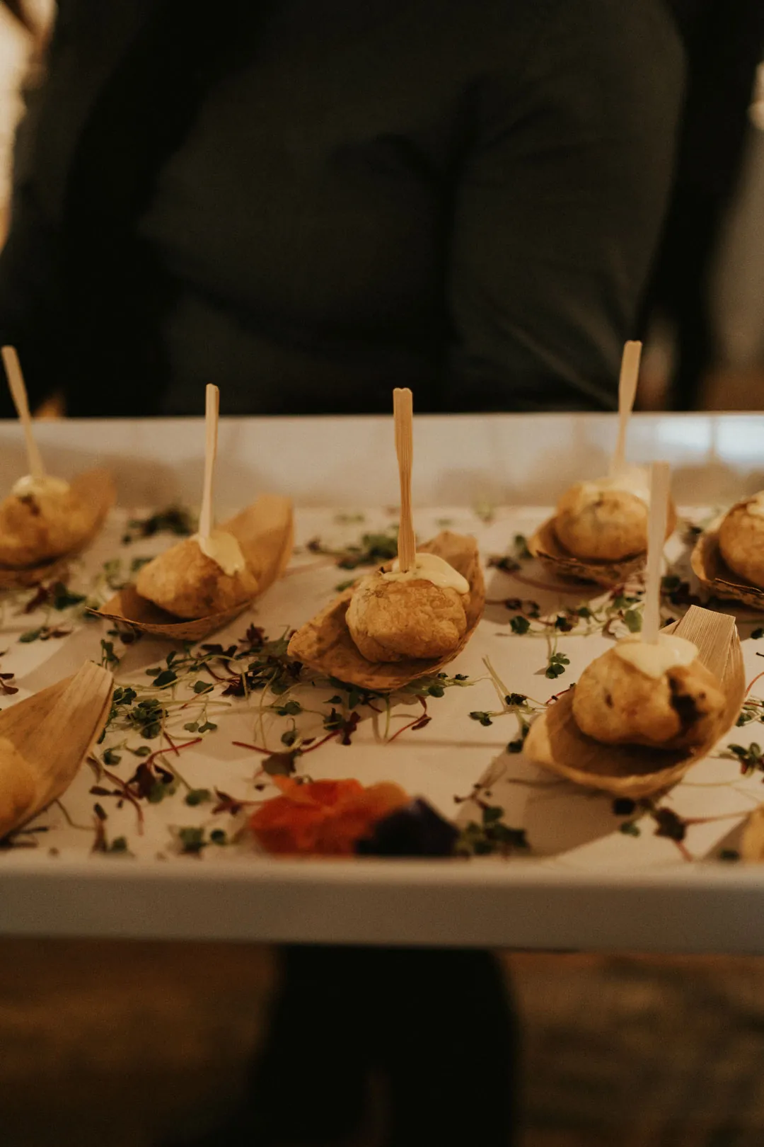 Small appetizers arranged on a serving board