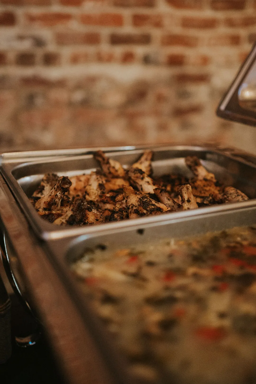 Buffet trays filled with prepared food