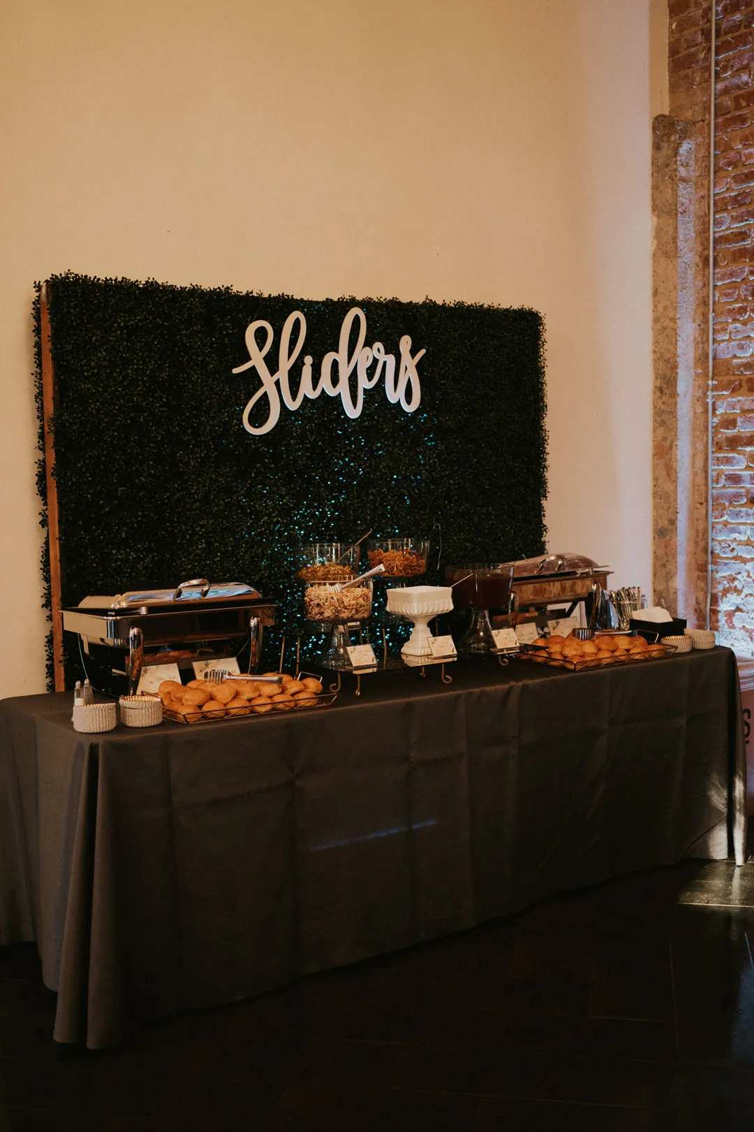 Catering station beneath a Sliders sign
