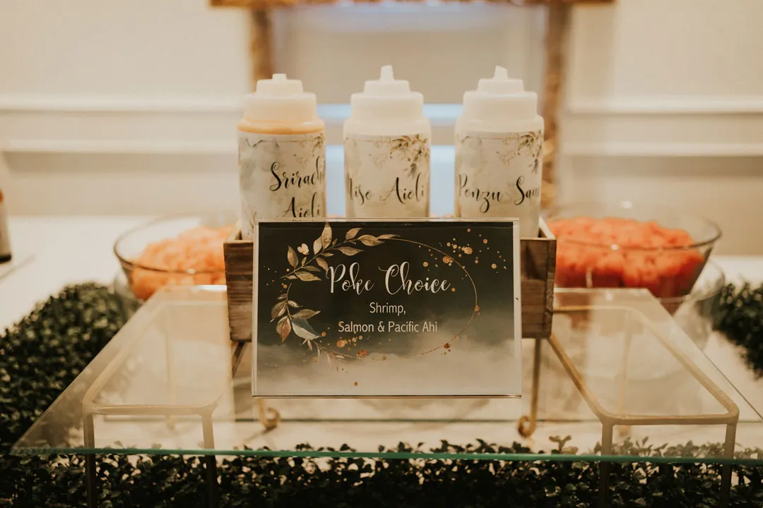 Squeeze bottles and ingredients at a catering station