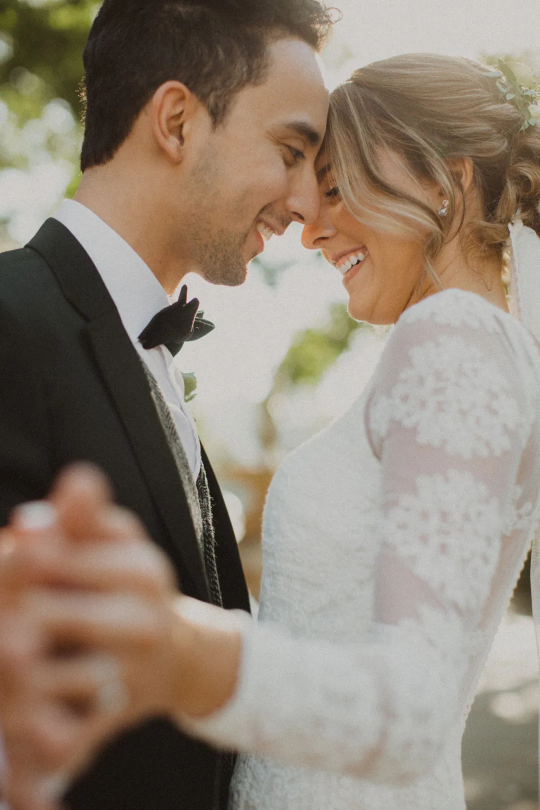 Couple leaning together during their dance