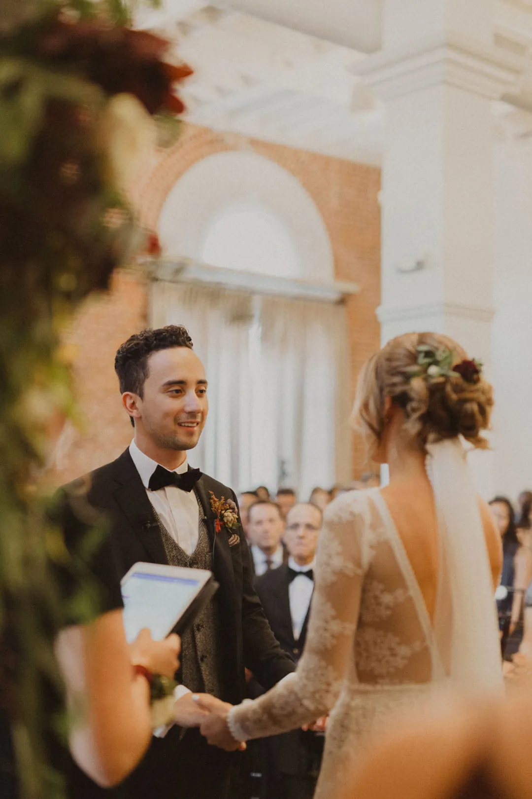Couple facing one another during their wedding ceremony