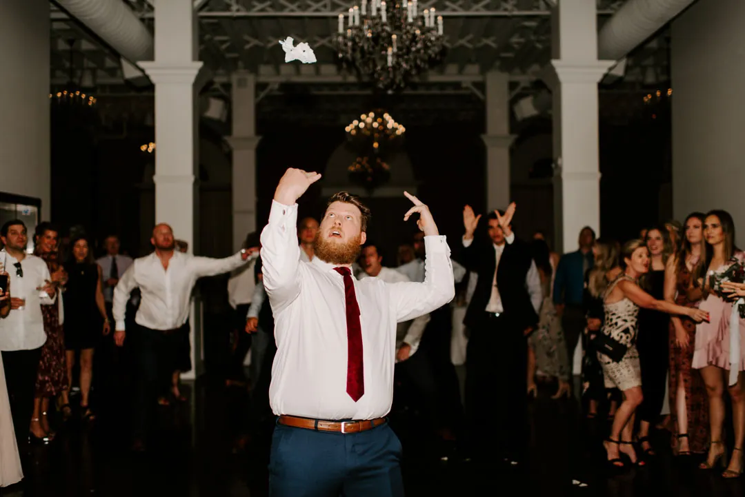Groom celebrating on the dance floor