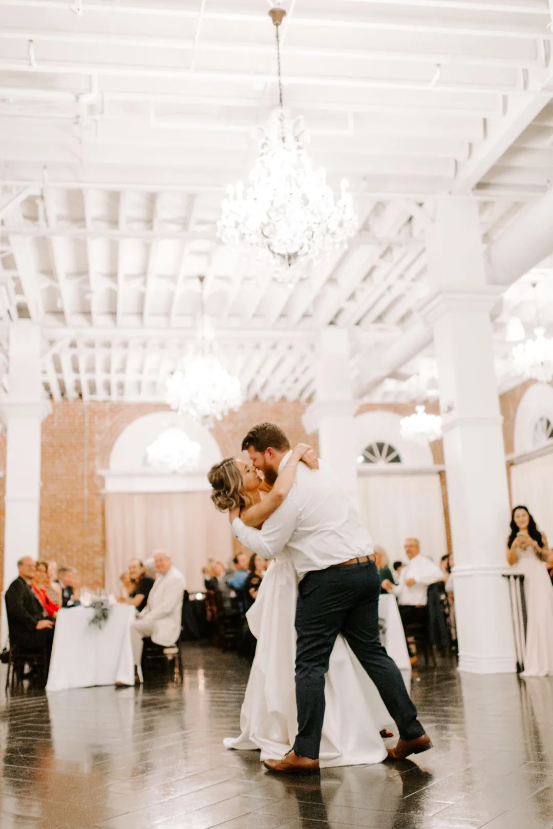 Bride and groom dancing in the ballroom
