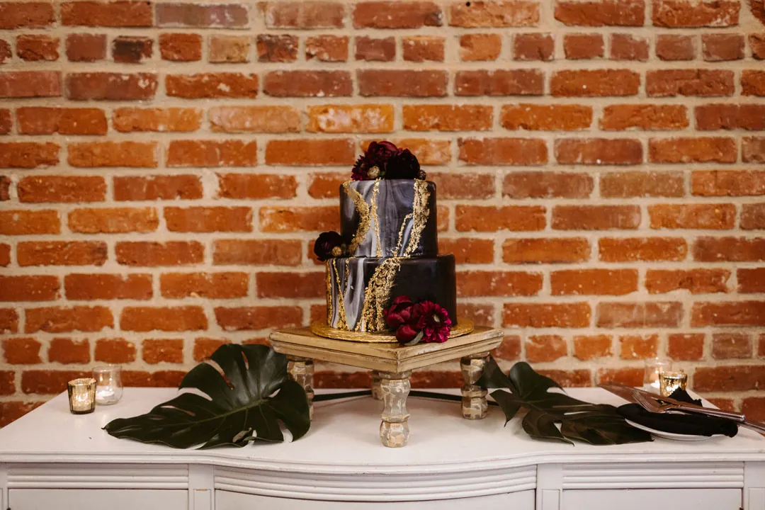 Small desserts displayed against exposed brick