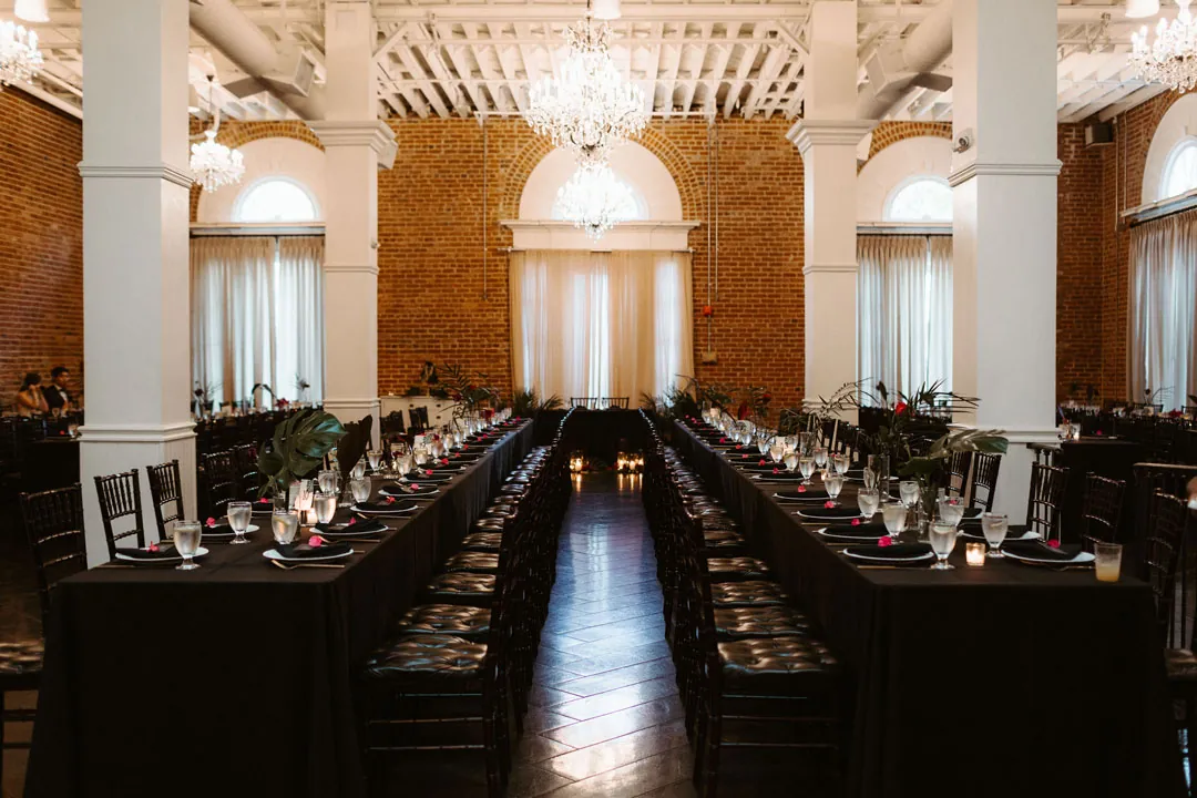 Parallel reception tables through the brick ballroom
