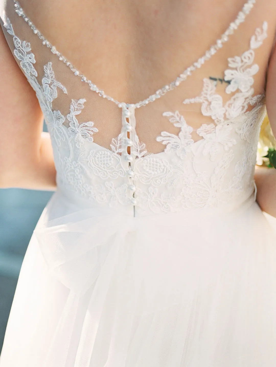 Lace detail on the back of a wedding gown