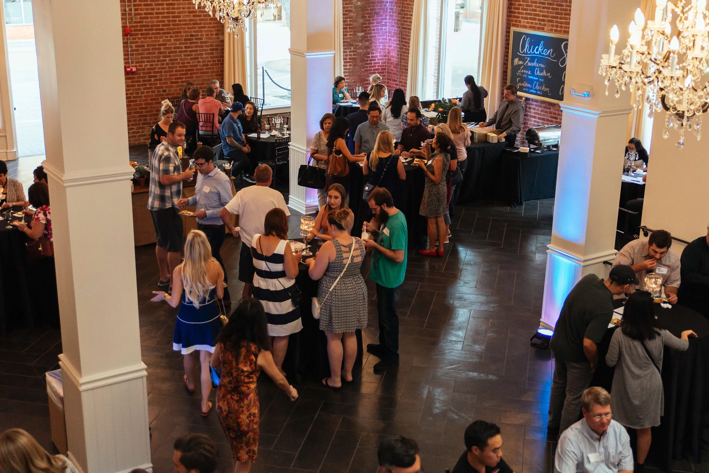 Guests socializing in the event reception room