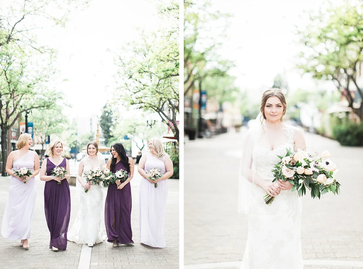 Bride approaching her attendants beneath leafy trees