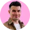 Profile pic of Chris Young on a pink background
