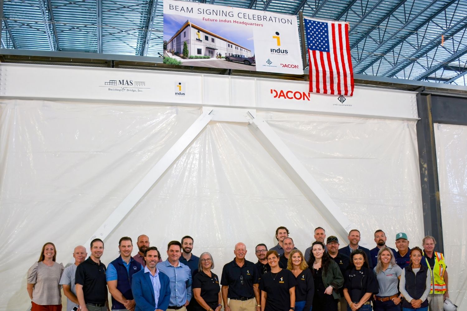 Dacon Corporation, indus, and VMD Companies Celebrate Major Construction Milestone with Cross Beam Signing Ceremony