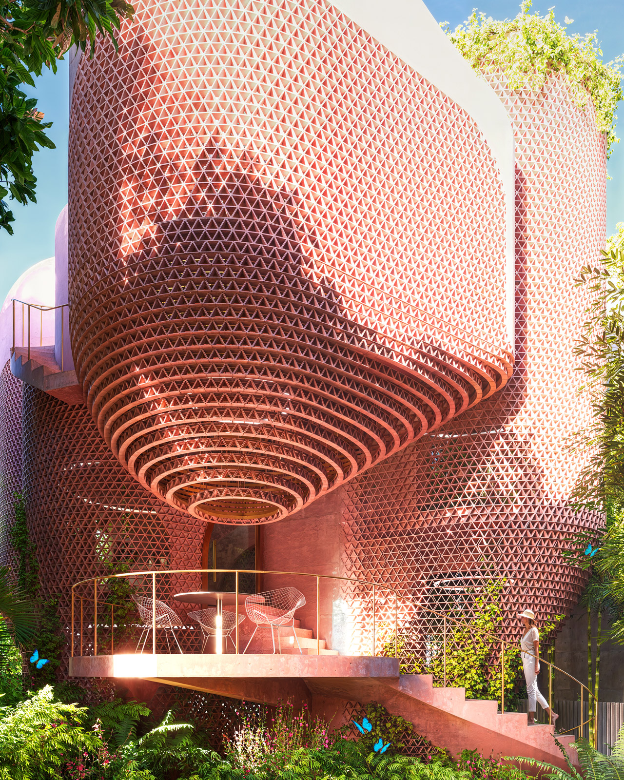 Garden entry perspective of the Miami Beach House showing the planted approach, outdoor threshold, and platformed sequence