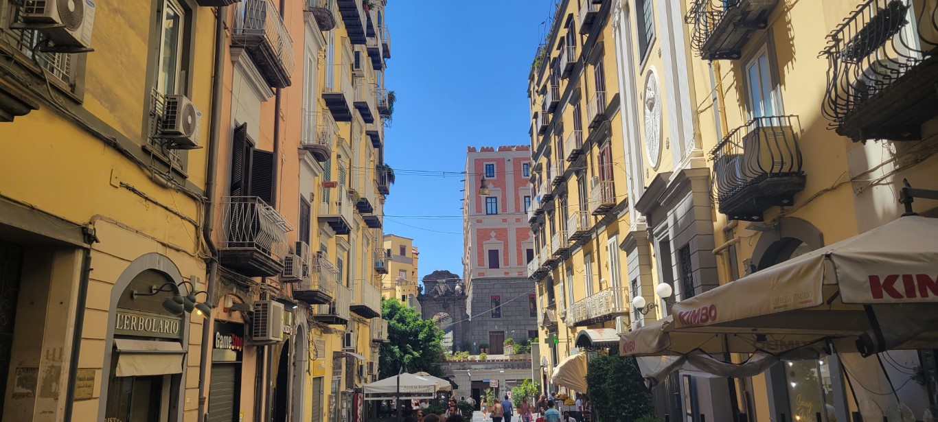 A street view in Naples, Italy of the yellow alleyways 