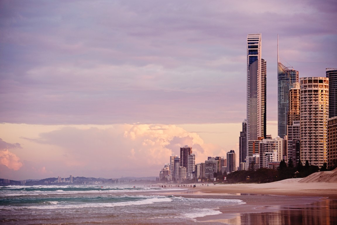 Beautiful view of the beach and highrise coastline on The Gold Coast at sunset