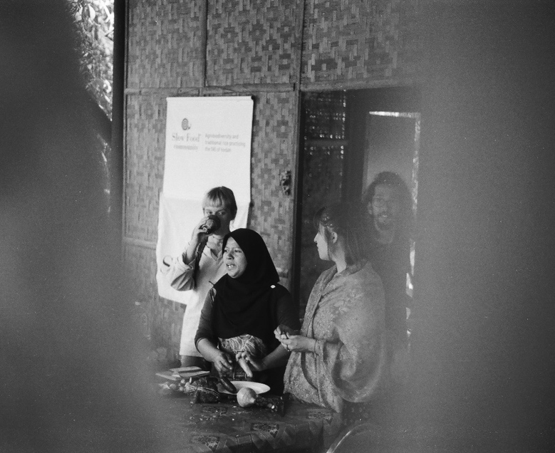 A picture of a local Malaysian woman leading a workshop for foreign volunteers