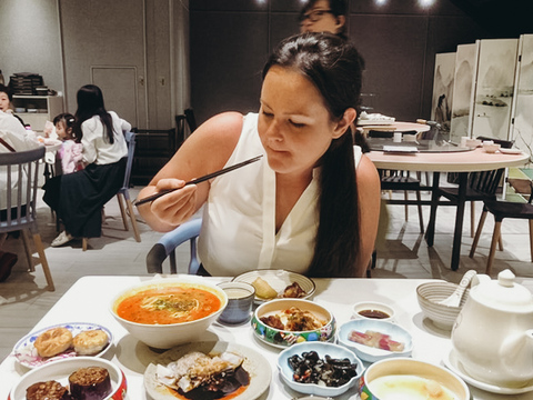 An expat teacher in Hong Kong eating out at a local restaurant