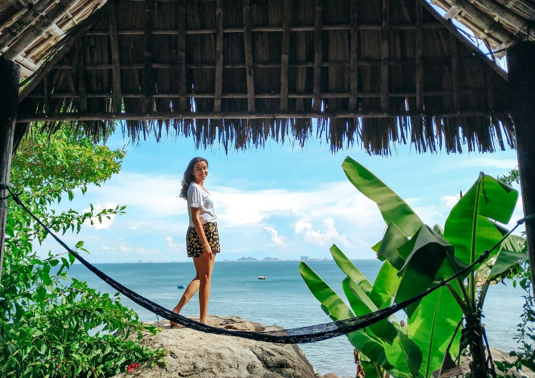 A digital nomad from Brazil at a lookout point overlooking the ocean in Da Nang, Vietnam 