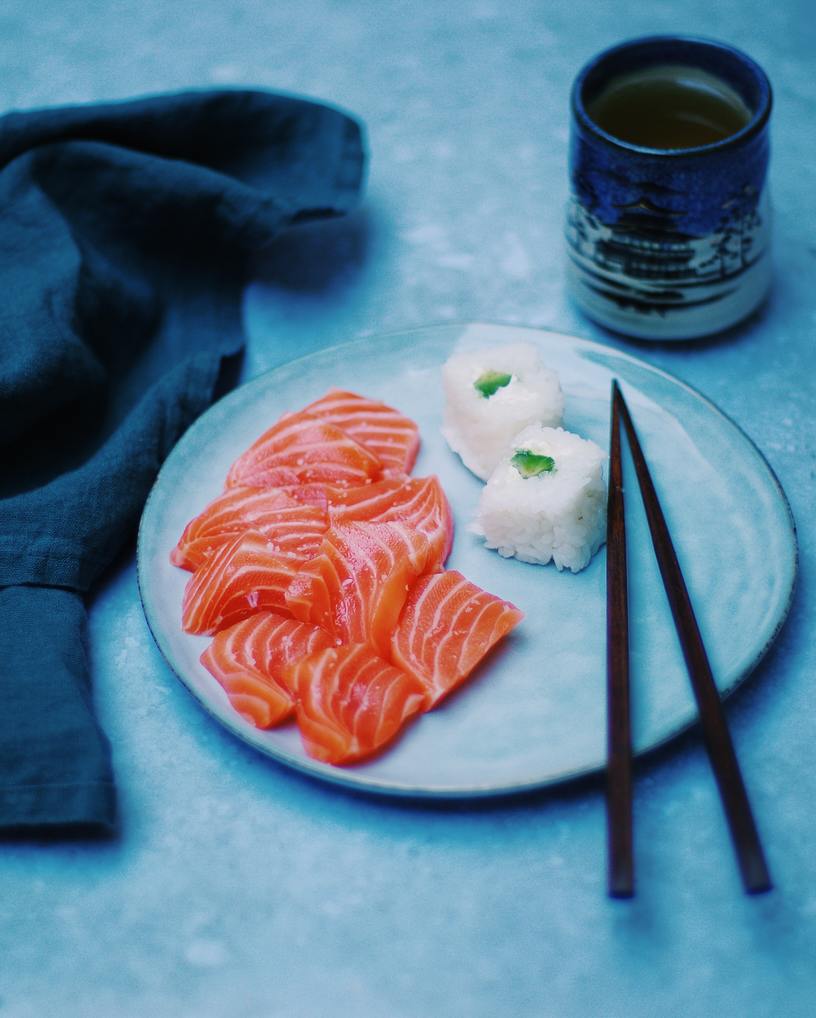 A plate of fresh sashimi and white rice in Japan