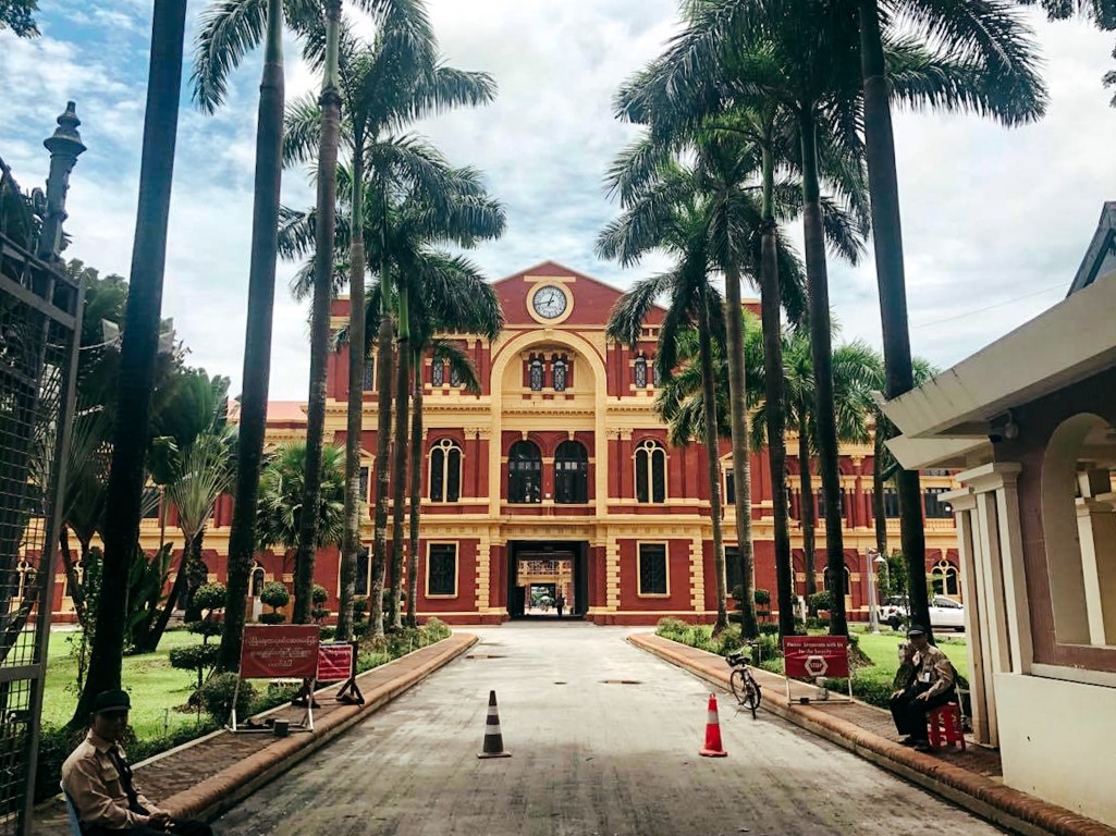 the red and yellow secretariat building in yangon, myanmar