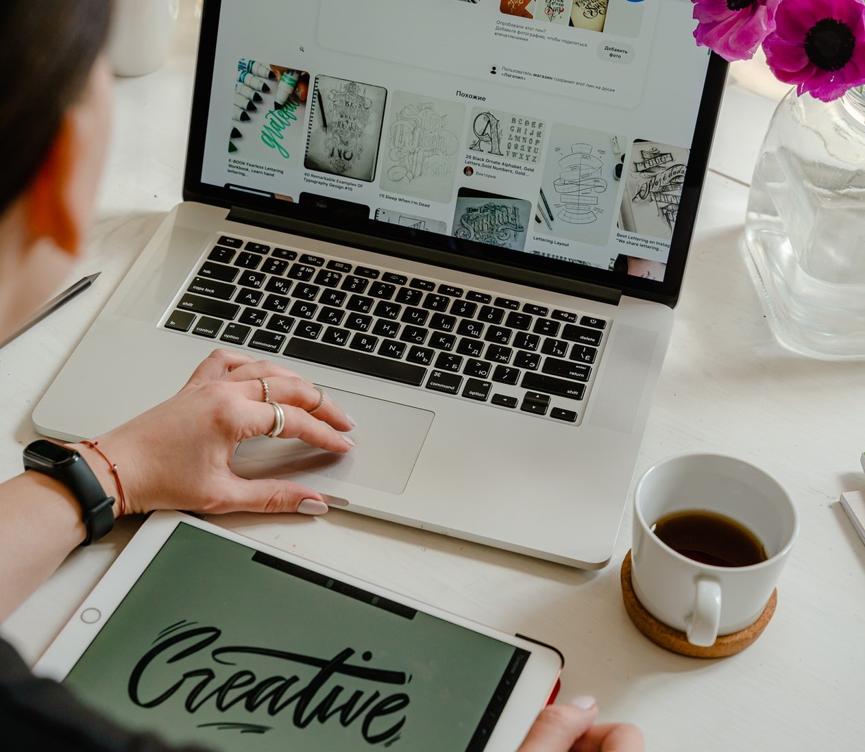 A graphic designer getting inspiration for a new project on Pinterest