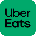 Uber Eats logo with black text on a green rounded square background.