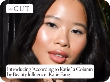 Close-up portrait of beauty influencer Katie Fang with glossy lips and highlighted skin.