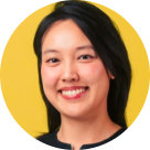 Portrait of a smiling woman with long black hair.
