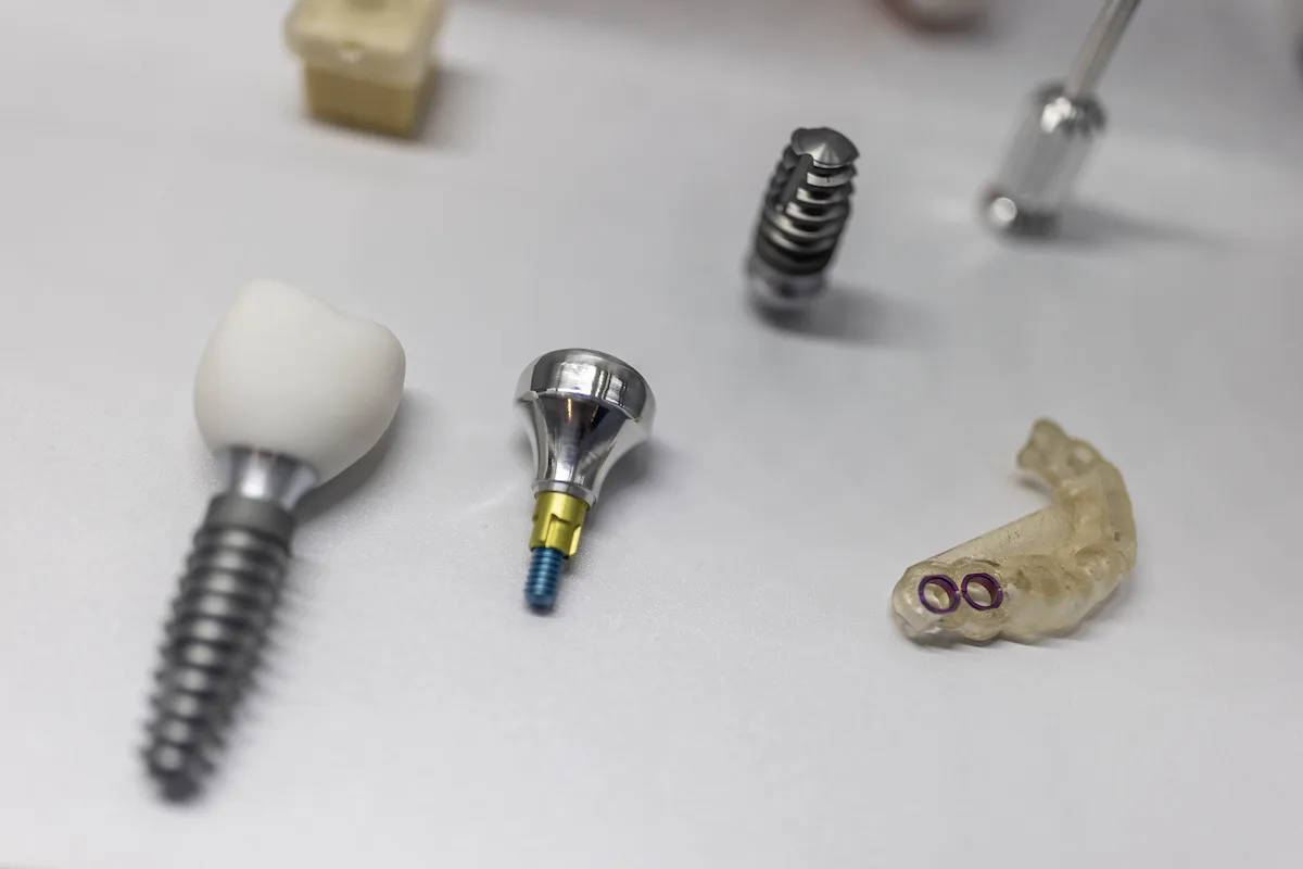 dentist showing little boy how to brush his teeth!