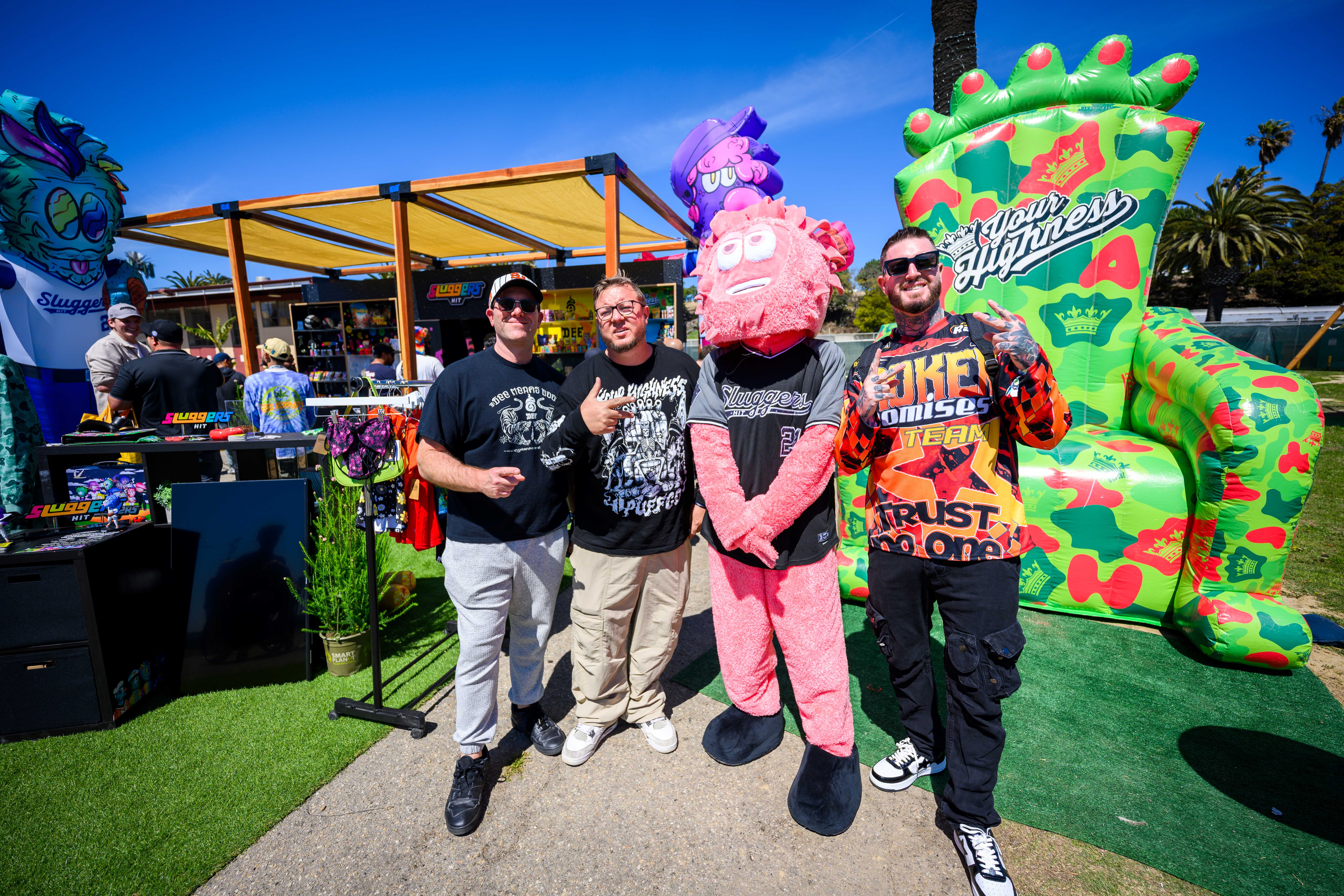 Sluggers Hit team with Sluggers pink mascot