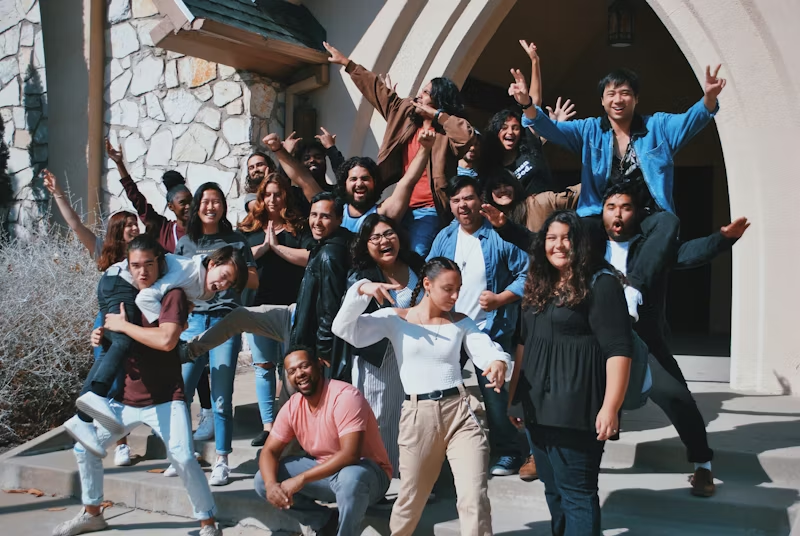 Young members of the church volunteer community smiling together.