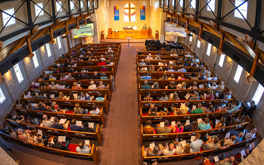 Congregation seated in a church during a service.